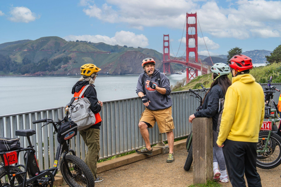 Cyclists paused on the Golden Gate Bridge walkway