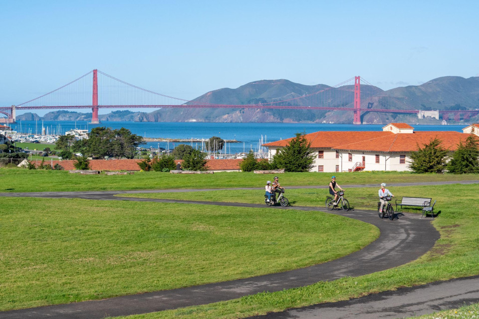 Curving bike path toward bridge and waterfront neighborhoods