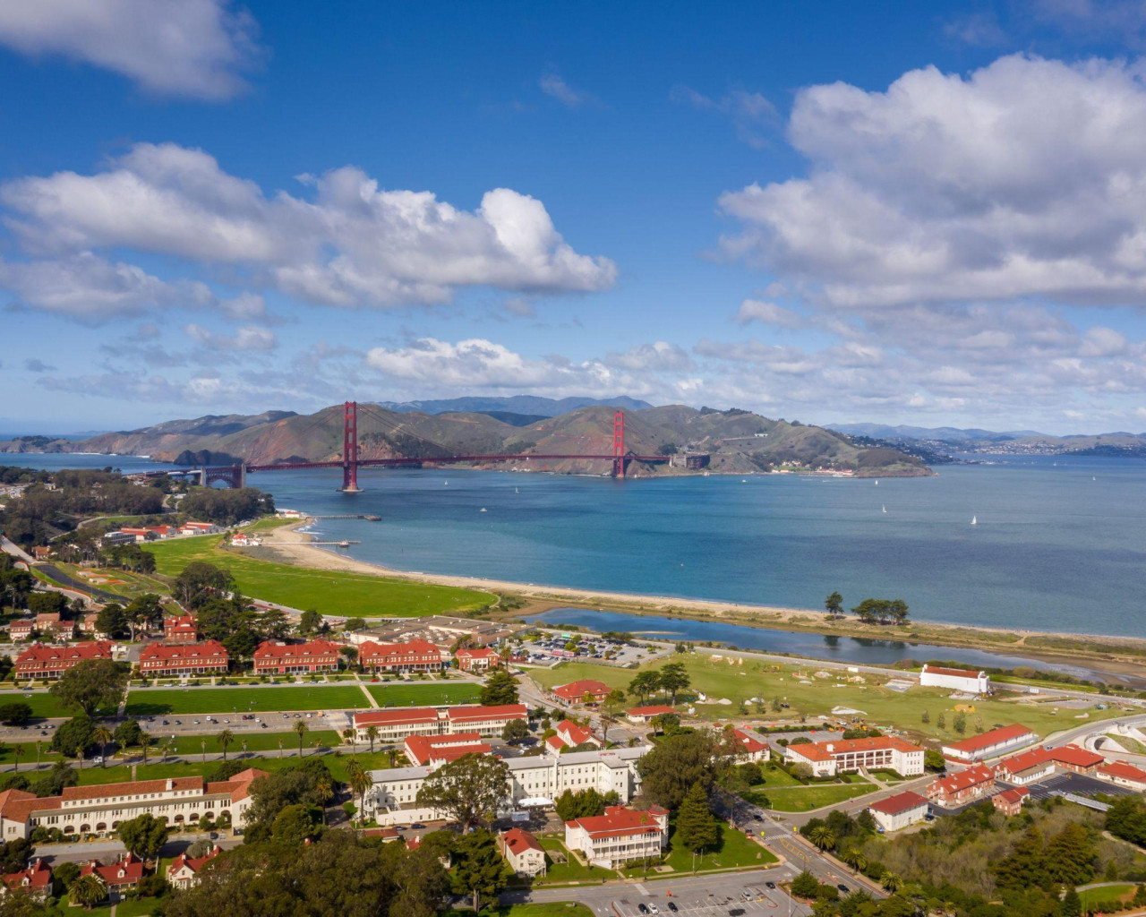 Wide scenic view of the Golden Gate Bridge and bay riding route