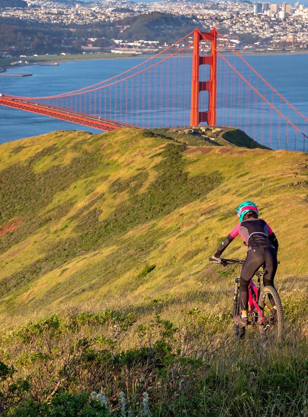 Riding a mountain bike off-road above the Golden Gate Bridge with amazing views!